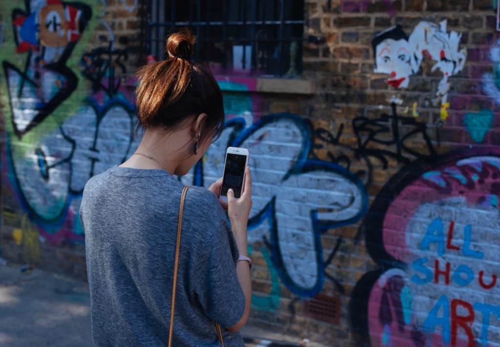 girl holding iphone